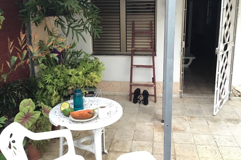 Having some fruits on the terrace of my roof top lodging in central Havana