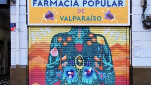 Colorful mural of a upper body for a farmacia popular
