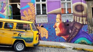 Yellow van and native woman face to face