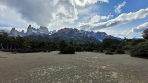 Mount Fitz Roy partly swallowed by clouds, viewed from the plain