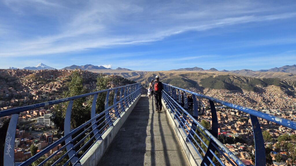 Walking on a bridge overlooking the city of LaPaz