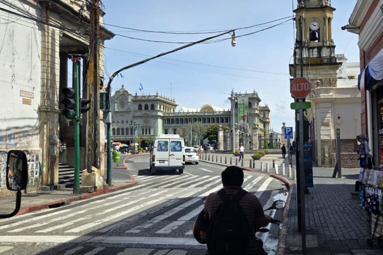 dark silhouette facing an historical building
