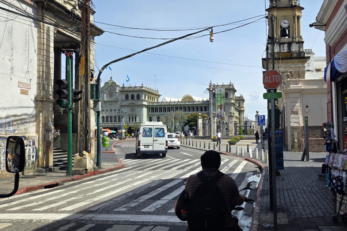 dark silhouette facing an historical building